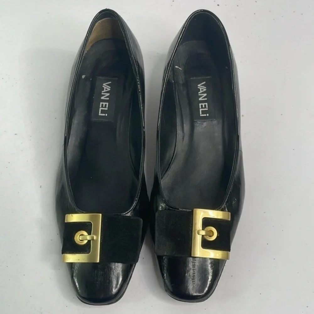 Vaneli black eel skin? Pumps w rounded square toe. Suede and gold buckle detail.